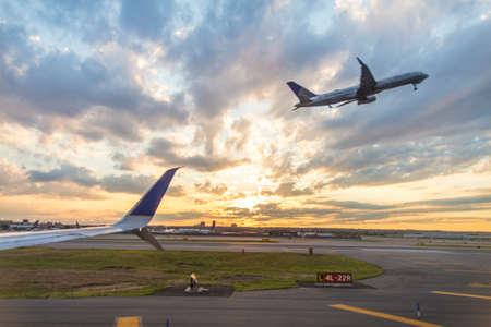 NYC, UNITED STATES - Jun 12, 2017: Flights landing and taking off from the airport runway in new...