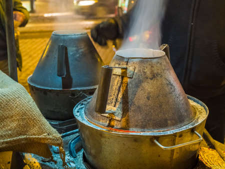 A beautiful shot of metal boilers on the streetsの写真素材