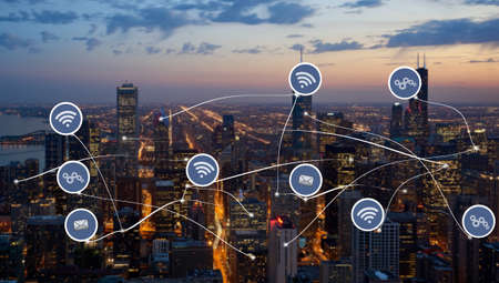 A beautiful shot of city buildings with lit lights  at night time and an illustration of the...