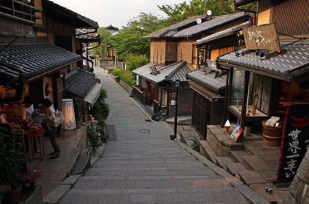 A wide angle shot of the stairs going between the buildings of a city