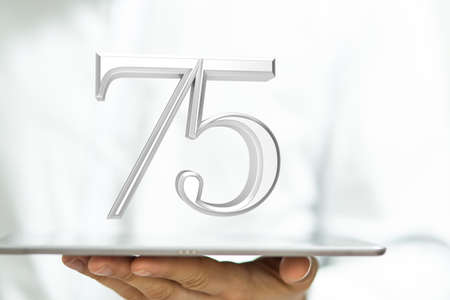 A virtual projection of digital numbers of seventy - five