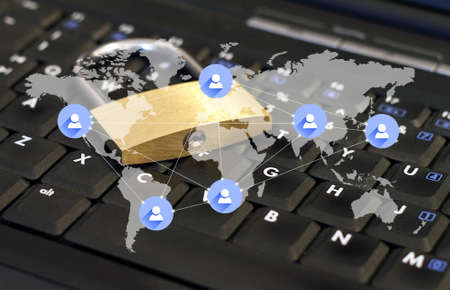 A global network and a lock placed on a keyboard