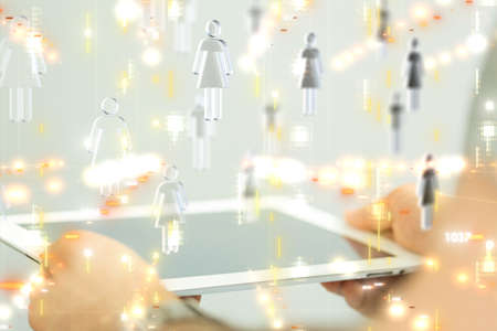 A businessman presenting a virtual projection of a team network - teamwork concept