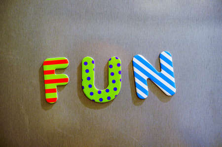 A closeup shot of colorful words spelling Fun