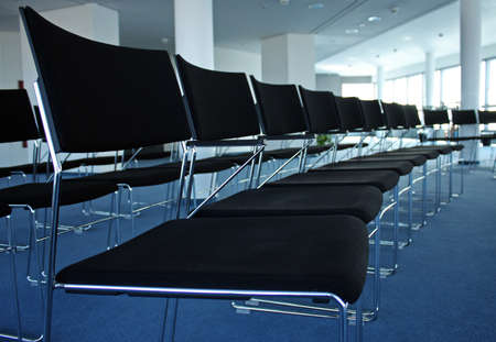 An interior shot of chairs in a conference room