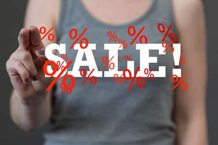 A person presenting the virtual projection of sale and numbersの写真素材