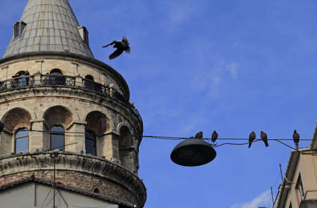 A low angle shot of the Galata Tower in European Turkeyの写真素材