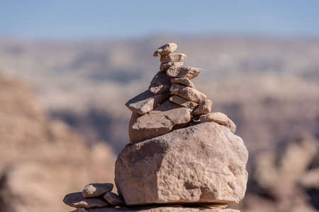 A closeup shot of stones stacked on each other with a blurred background