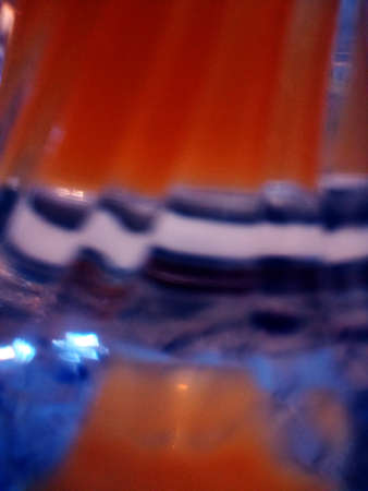 A closeup shot of a surface painted with multiple colors and patterns