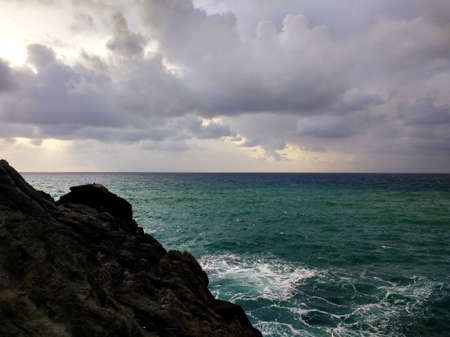 A beautiful shot of the sea from the rocky beach of Fuerteventura, Spain.