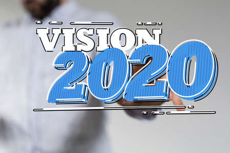 A businessman presenting a virtual projection of a yearly business solution for the year twenty-twentyの写真素材