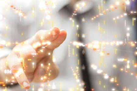 A businessman creating a virtual projection of a connection network