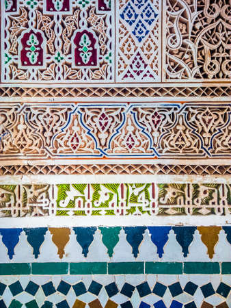 A closeup shot of a wall having different patterns of multiple colors painted on itの写真素材