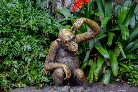 A beautiful shot of a monkey statue in loro park zoo in spainの写真素材