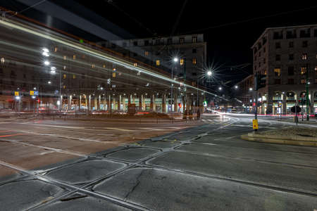 A beautiful shot of tramway in navigli district of milan italy during a winter evening with a clear...