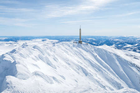High snowy mountain landscape with blue skyの写真素材