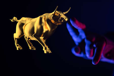 A businessman creating a virtual digital bullish diagram - business intelligence conceptの写真素材