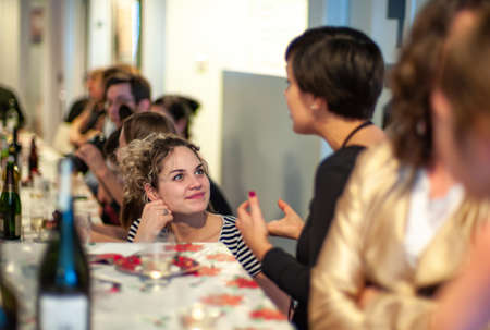 MONTREAL, CANADA - Dec 13, 2012: Montreal, Quebec / Canada - December 14 2012: Caucasian Woman Listens With full Attention to her Partner at a Meeting Outside of Workのeditorial素材