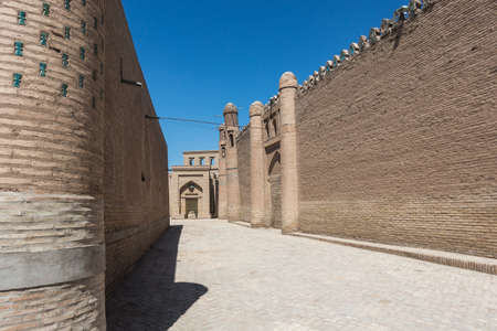 A wall and a Great Minaret of the Kalon - Bukhara, Uzbekistanのeditorial素材