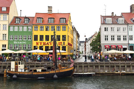 COPENHAGEN, DENMARK - Jul 13, 2018: Nyhavn is a 17th-century waterfront, canal and entertainment...