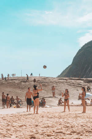 RIO DE JANEIRO, BRAZIL - Jan 20, 2020: People playing voleyball on the beach in Rio de Janeiro.のeditorial素材