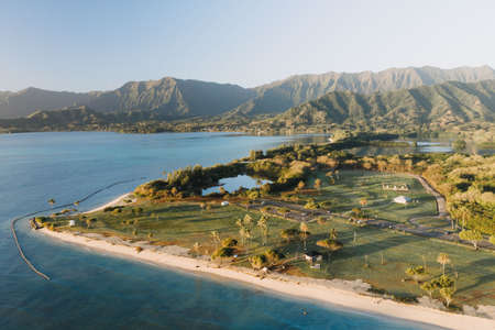 A high angle shot of a beautiful seashore with a blue sky in the backgroundの写真素材
