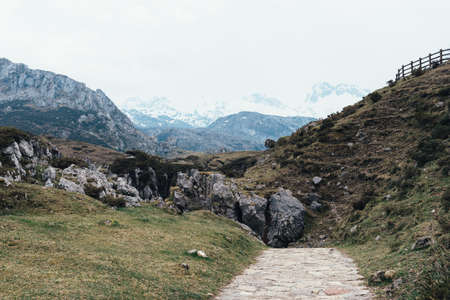 A beautiful shot of the rocky mountains on a clear day taken from the sidewalkの写真素材