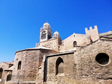 A low angle view of the Marseille Cathedral under the sunlight and a blue sky in Franceの写真素材