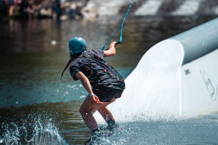 MUNICH, GERMANY - Jun 30, 2019: Professional wakeboarding athlet at the munich mash open tournament in munichのeditorial素材