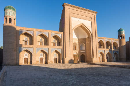 A beige building Khojamberdibai Madrassah Khiva in Uzbekistanのeditorial素材