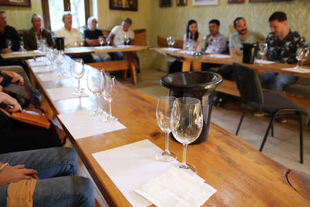 TBILISI, GEORGIA - Sep 26, 2019: Tourists enjoying a wine tasting event at a local winery. This is a popular tourist attraction in Georgia.のeditorial素材