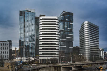 A beautiful shot of city big city buildings under a blue sky in Seattle