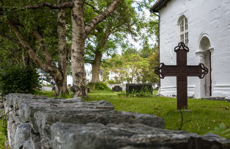 A cemetery in the yard of a church around Alesund, Norway during Summerのeditorial素材