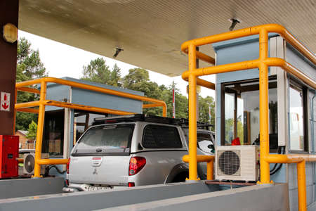 PLETTENBERG BAY, SOUTH AFRICA - Jan 03, 2019: Cars passing through the Tsitsikamma toll gate on the N2 national road.のeditorial素材