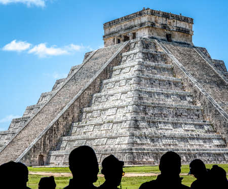 A closeup shot of Chichen Itza in Mexico under a clear blue skyのeditorial素材