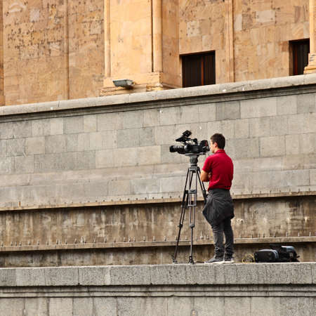 TBILISI, GEORGIA - Sep 22, 2019: cameraman filming outside the Georgia Parliament building on Rustaveli Avenue. News and media concept image.のeditorial素材