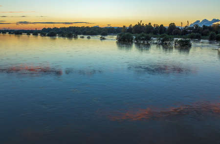 A high angle shot of a beautiful sava river in zagreb, croatia with a scenery of sunset