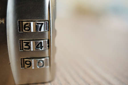 A closeup shot of a metal combination padlockの写真素材
