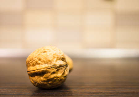 A closeup shot of the whole walnut with shellの写真素材
