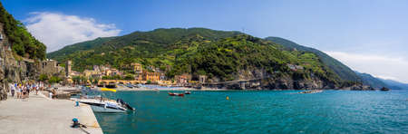 MONTEROSSO, ITALY - Jul 07, 2019: The sea and sandy beach Spiaggia di Fegina at the Cinque Terre...