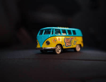 A green and blue toy with black backgroundの写真素材