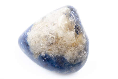 A white and blue natural mineral stone against a white backgroundの写真素材