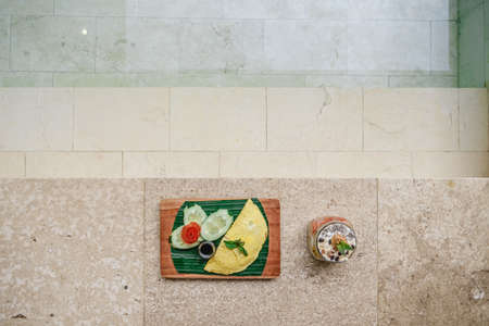 A high angle shot of a tray of food next to the ice creamの写真素材