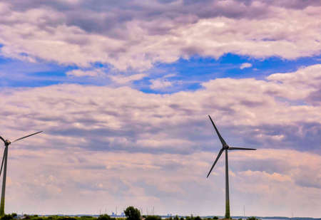 A low angle shot of windmills in the Canary Islands, Spain under a cloudy sky