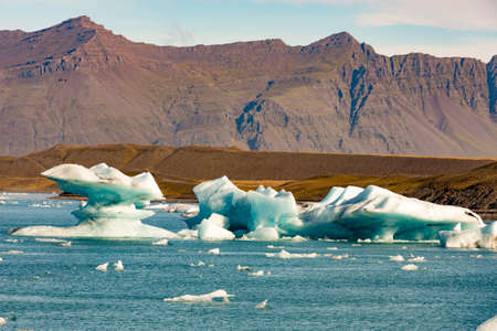 The melting glacial ice in a glacier lagoon in Iceland