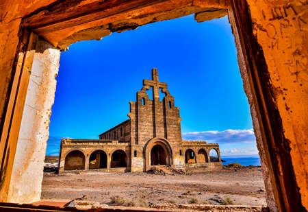 A low angle shot of an abandoned building in a military base in the Canary Islands, Spainの写真素材