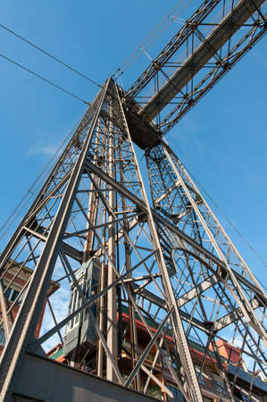 PORTUGALETE, SPAIN - Oct 24, 2009: A low angle view of a transportation bridge under the sunlight...