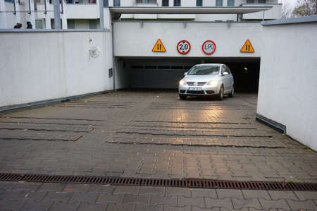 Poznan, Poland - November 2, 2013: Parking garage at a apartment buildingの写真素材