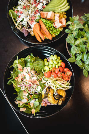 A vertical shot of salads with fresh vegetablesの写真素材