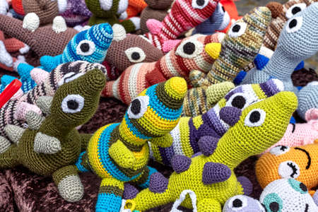 Handmade colorful crocheted mascots background